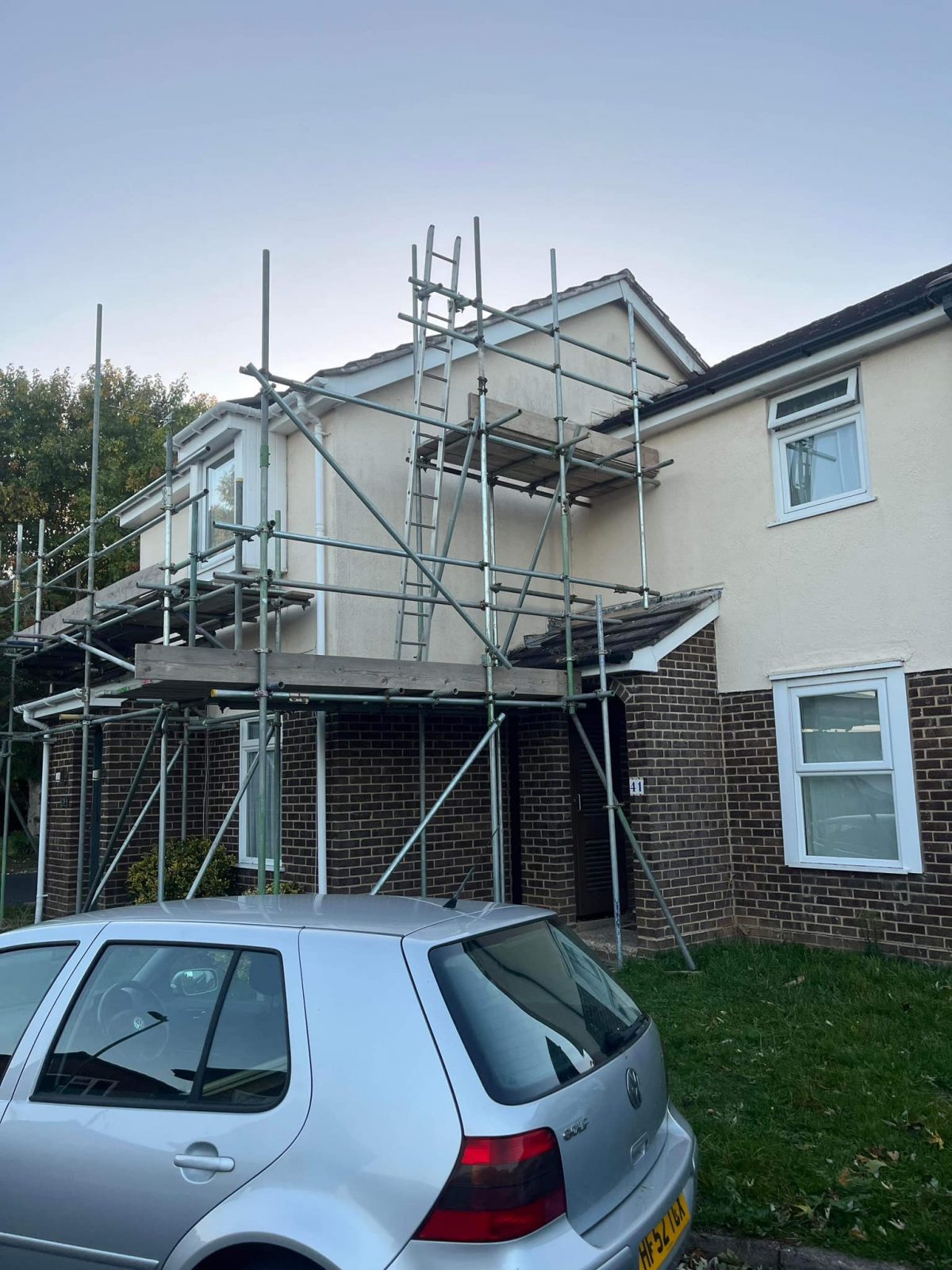 Property with scaffolding outside